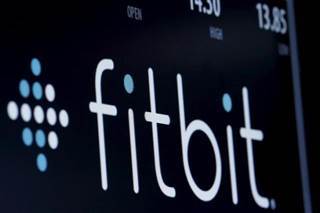The ticker symbol for Fitbit is displayed at the post where it is traded on the floor of the NYSE The ticker symbol for Fitbit is displayed at the post where it is traded on the floor of the NYSE