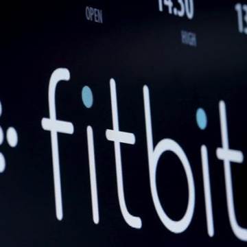 The ticker symbol for Fitbit is displayed at the post where it is traded  on the floor of the NYSE