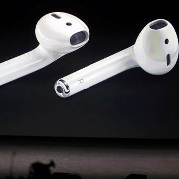 Phil Schiller discusses the Apple AirPods during a media event in San Francisco