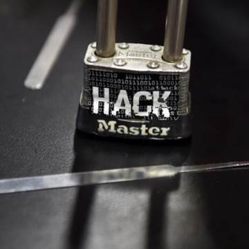 A padlock is displayed at the Alert Logic booth during the 2016 Black Hat cyber-security conference in Las Vegas