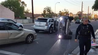 Image: A self-driven Volvo SUV owned and operated by Uber Technologies Inc. is flipped on its side after a collision in Tempe Image: A self-driven Volvo SUV owned and operated by Uber Technologies Inc. is flipped on its side after a collision in Tempe