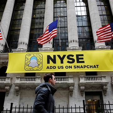 Image: A Snapchat sign on the facade of the NYSE in New York City